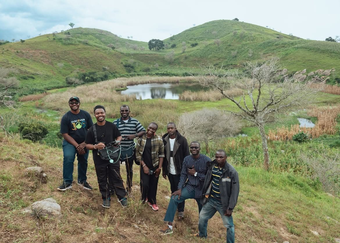 Plateau landscape — green hills and open farmland outside Jos