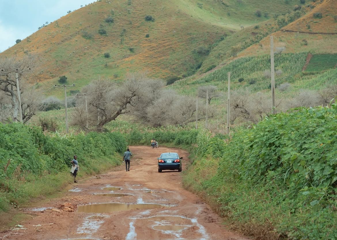 Plateau landscape — green hills and open farmland outside Jos
